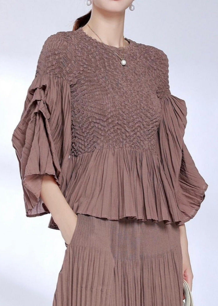 Miranda - Peplum hem part pleated top