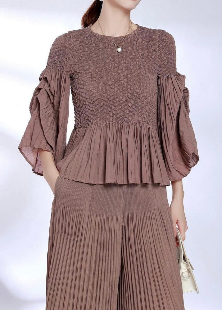 Miranda - Peplum hem part pleated top