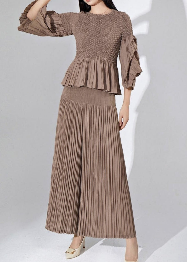 Miranda - Peplum hem part pleated top