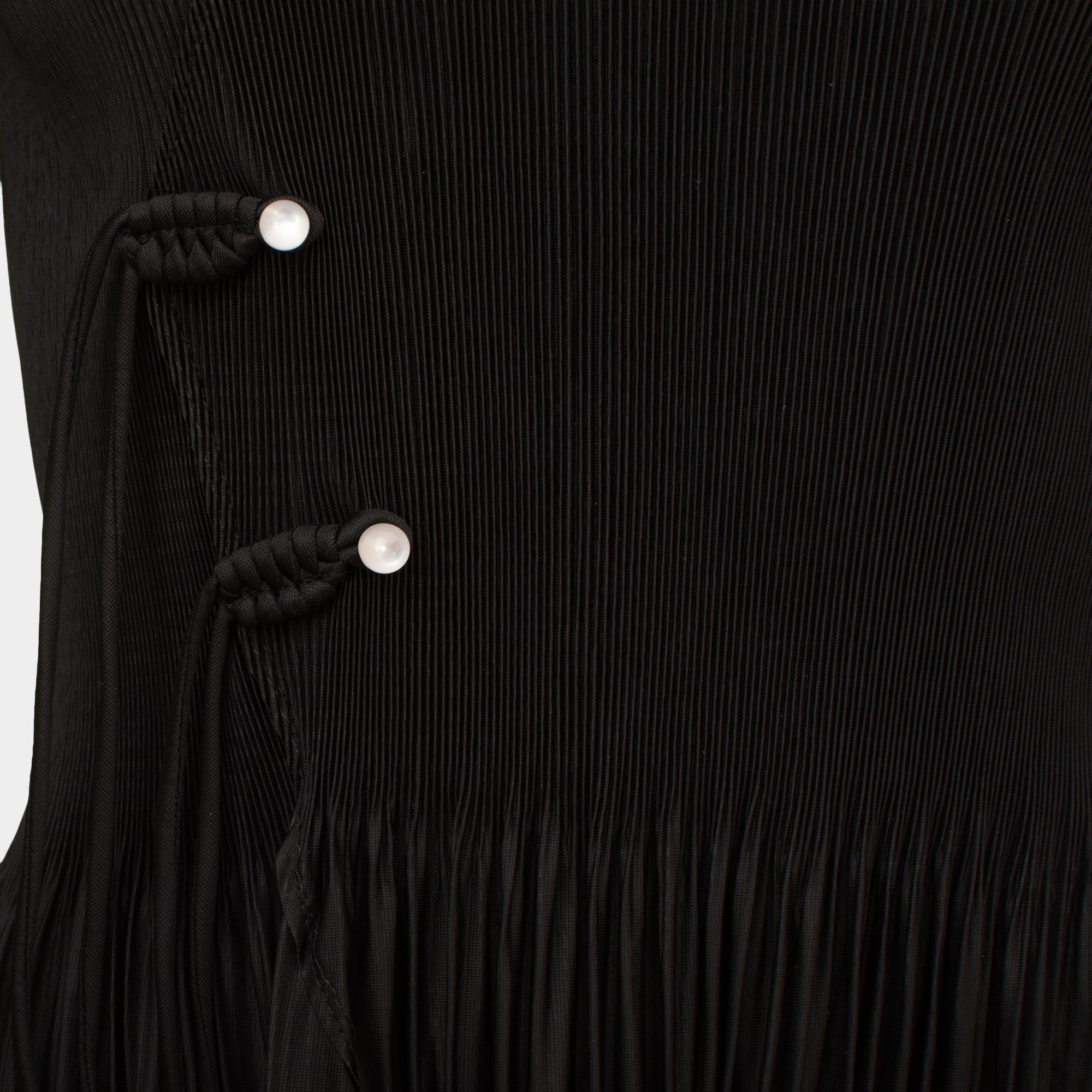 Anais black cross front frill hem pleat top