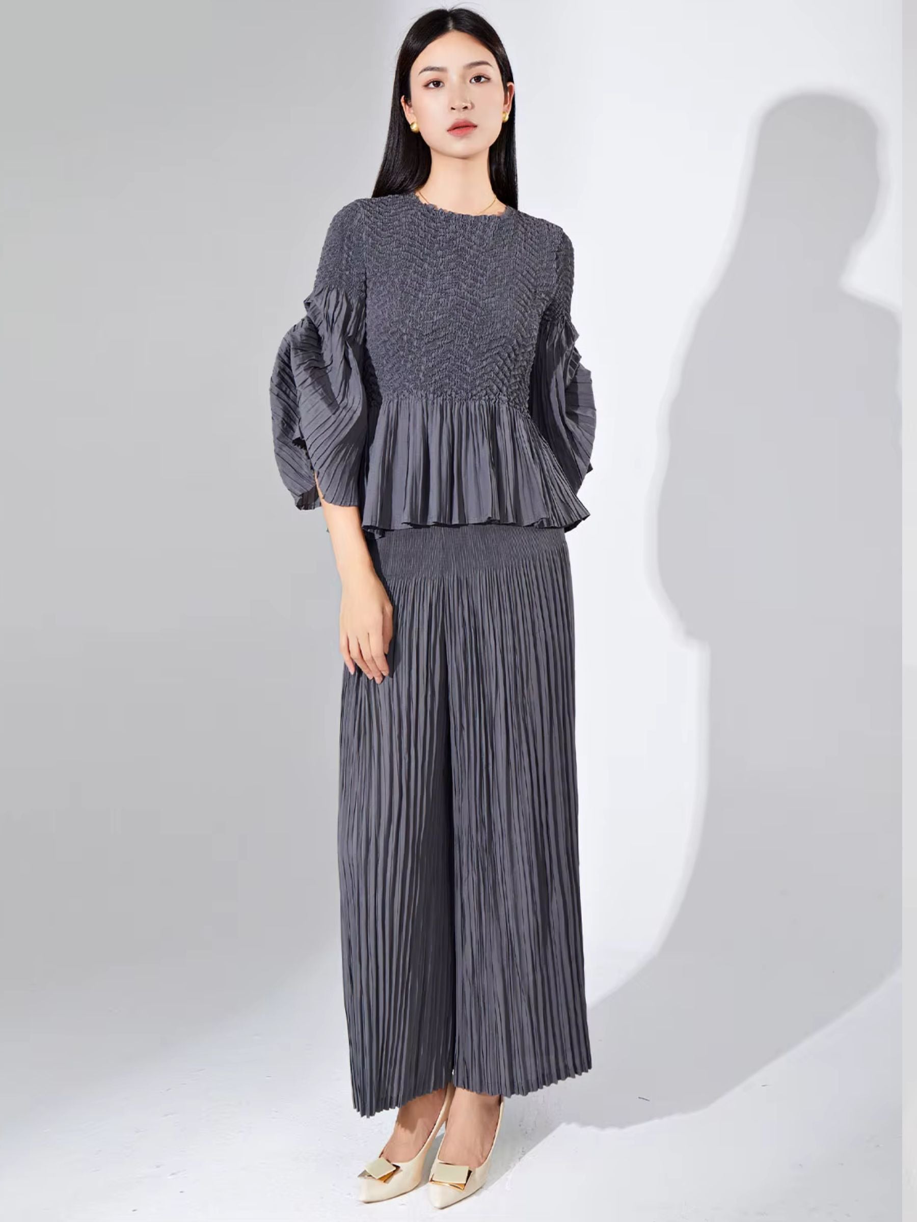 Miranda - Peplum hem part pleated top