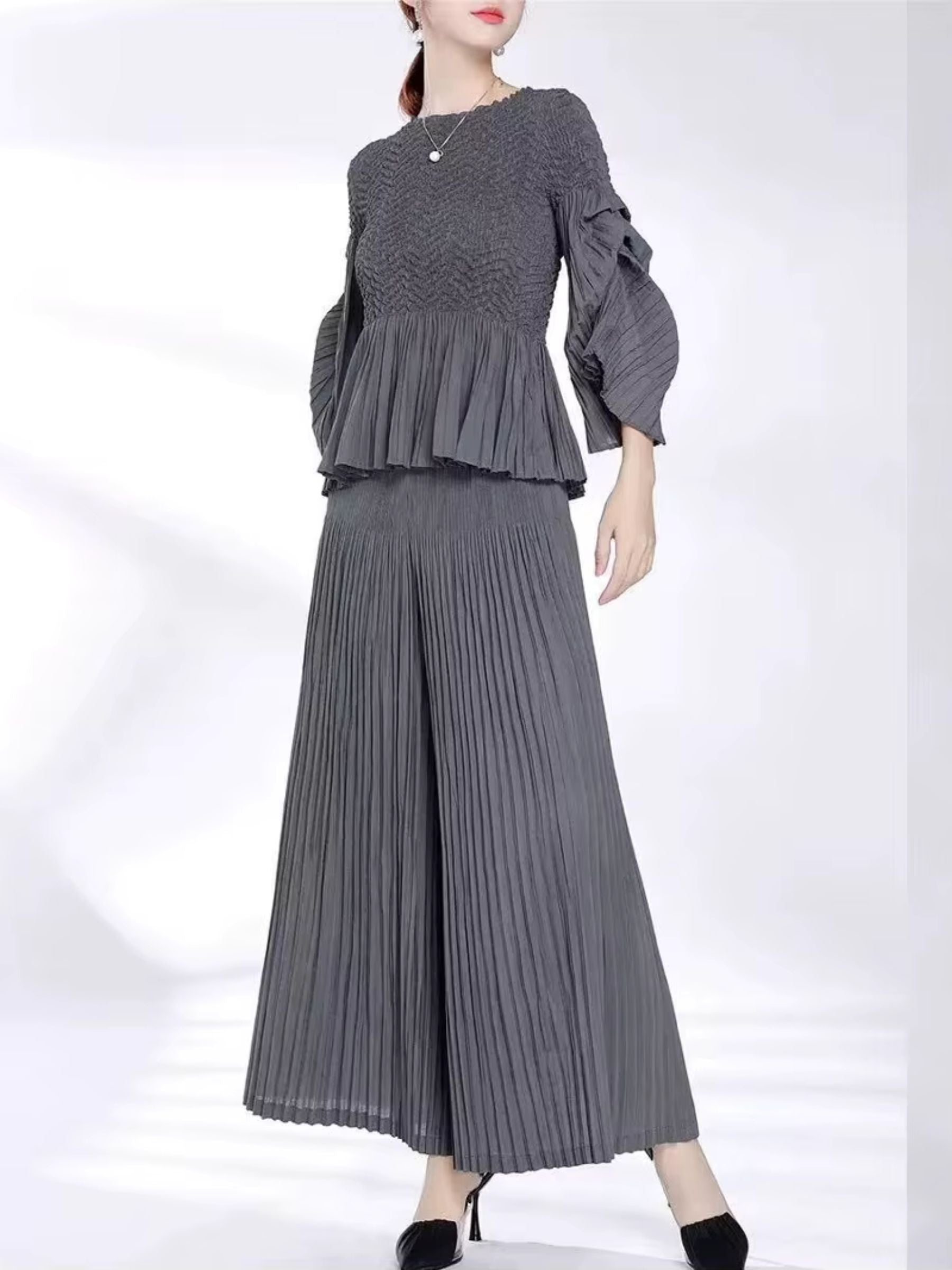 Miranda - Peplum hem part pleated top