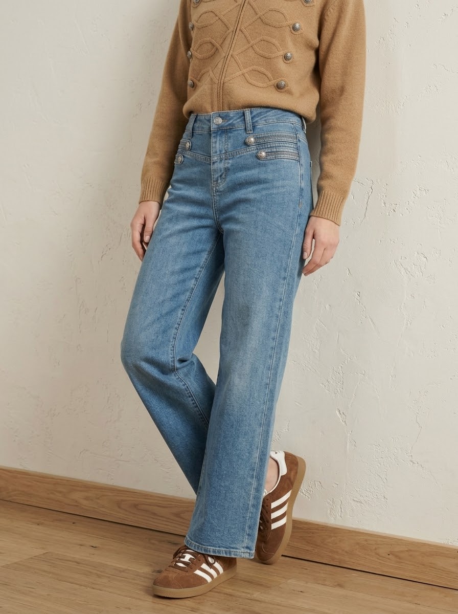 Model wearing Danni military button wide-leg jeans in denim blue, front three-quarter view