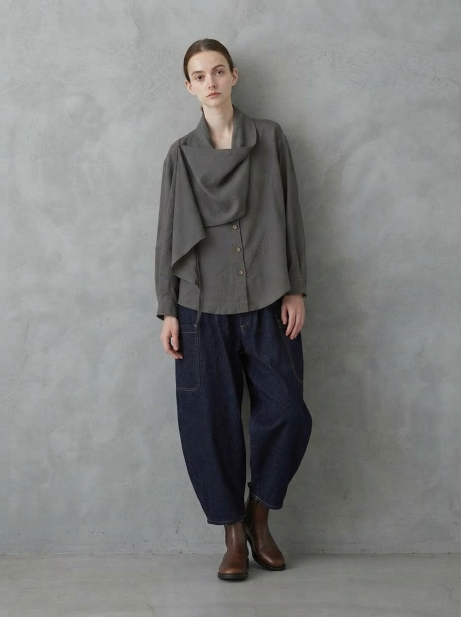Model wearing Darla scarf collar blouse in chocolate with jeans, front view