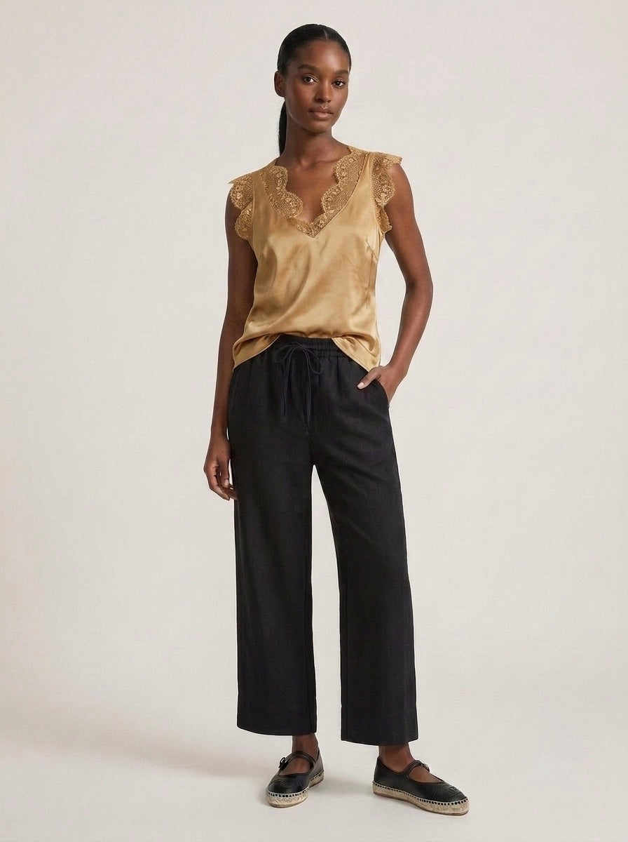 Caramel Lacey satin viscose cami top, lace detail view, with lace-trimmed V-neckline and arm openings