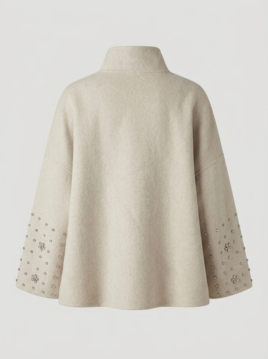 Cream Soraya wool blend cape jacket showing relaxed shape and side slit