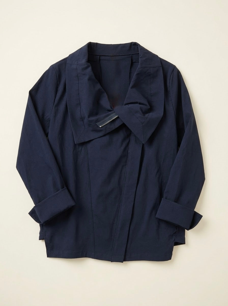 Navy Tia zip-up jacket, front flat lay with wide asymmetric collar