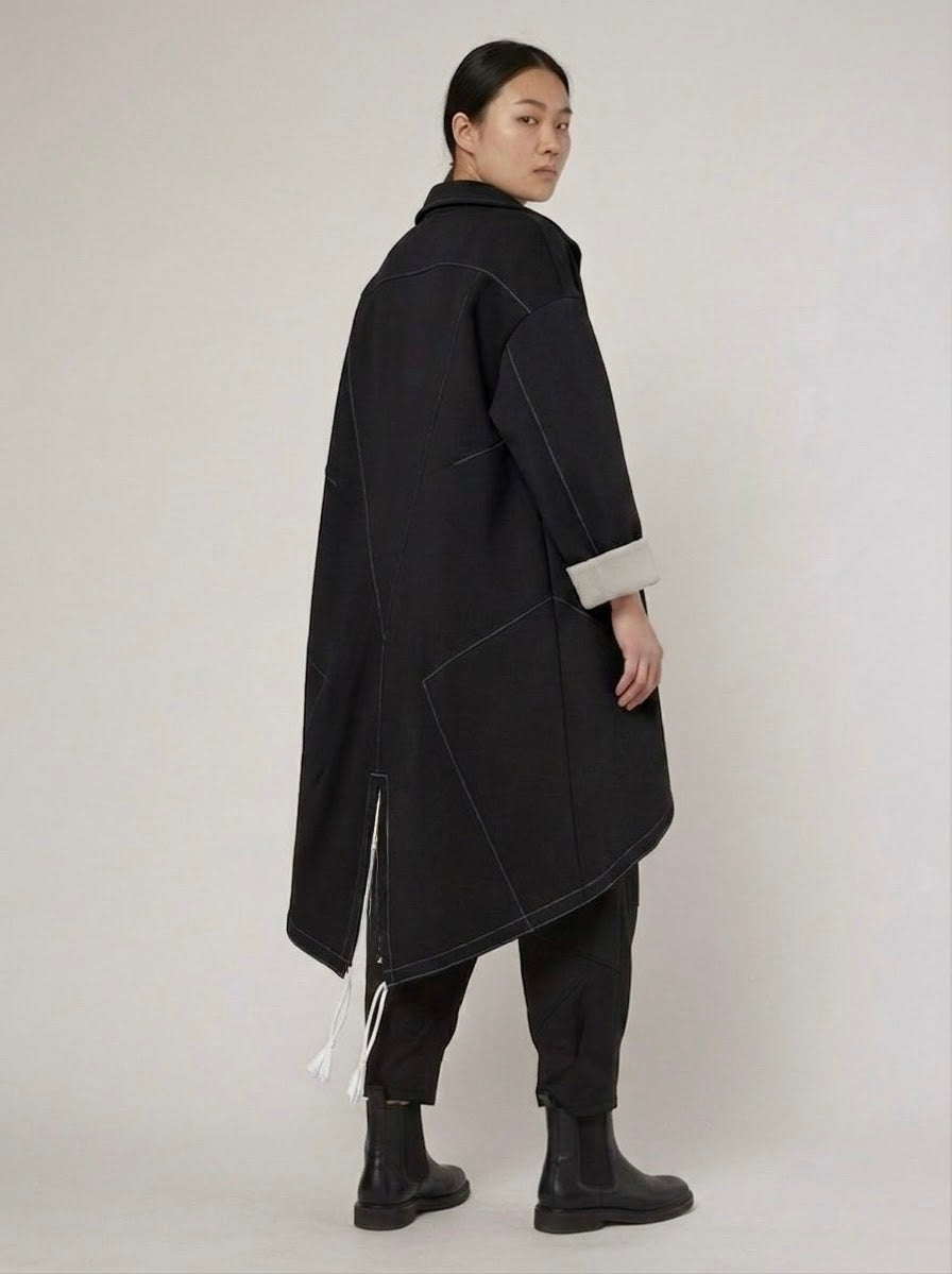Back view of the Bronte black midi coat showing its drawstring hem