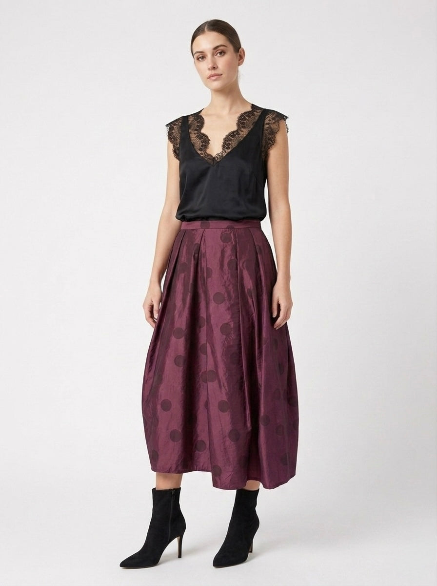 Model wearing the Brooke plum spot taffeta skirt, full-length view