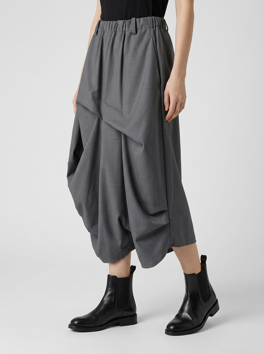 Close-up of the Robbie grey harem trousers showing the skirt-like draped front