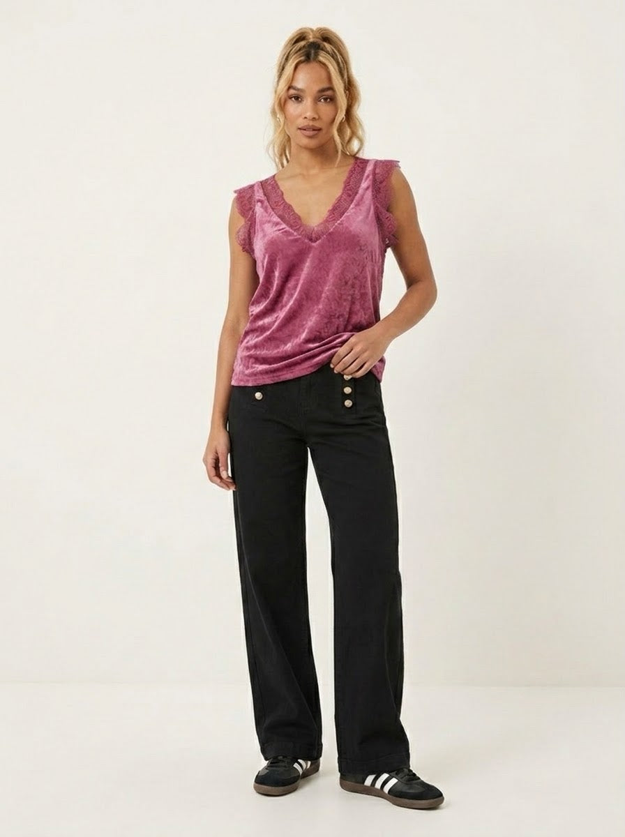 Model wearing the Bordeaux Lacey satin viscose cami top with lace-trimmed V-neckline and arm openings
