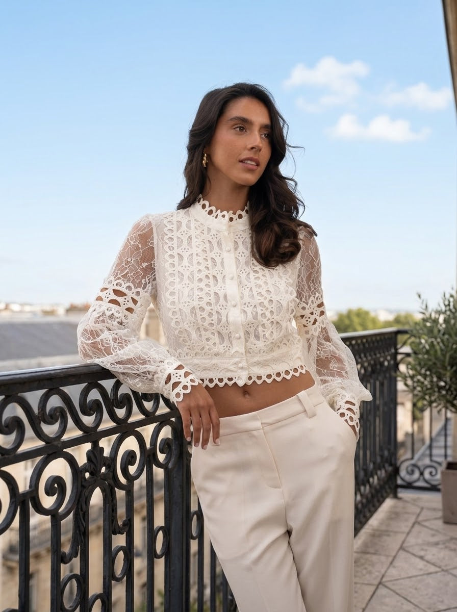 Model wearing cream Leanne crochet lace shirt with matching trousers