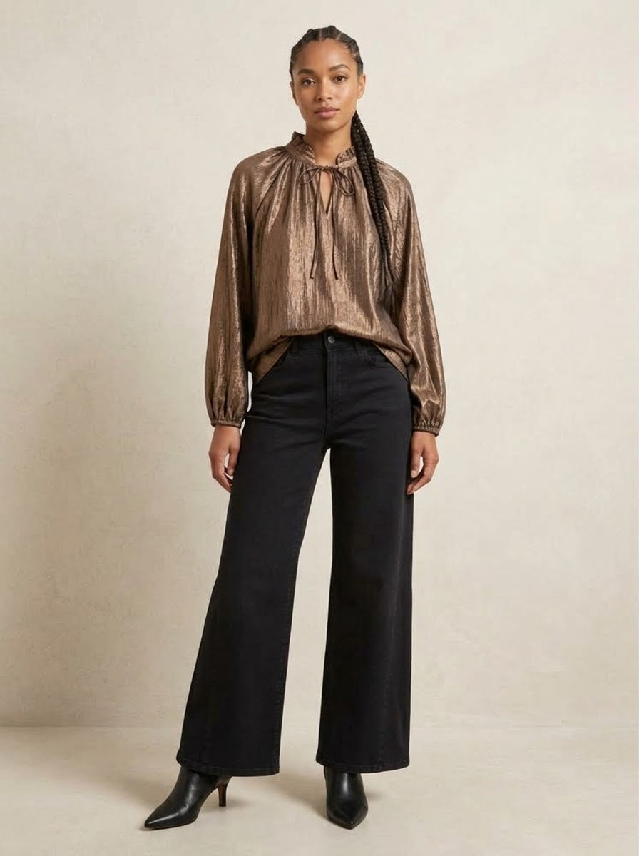Model wearing bronze Lilian lurex blouse, full front view