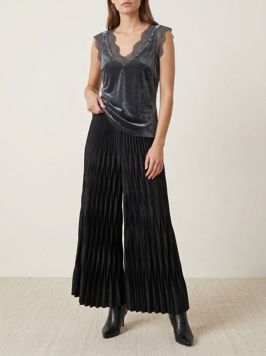 Model wearing the charcoal Lacey satin viscose cami top with lace-trimmed V-neckline and arm openings
