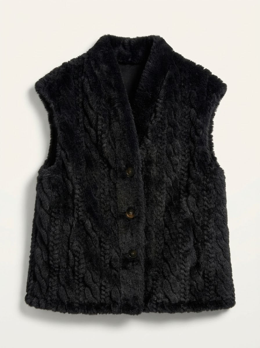 Gina black faux-fur gilet styled with jeans