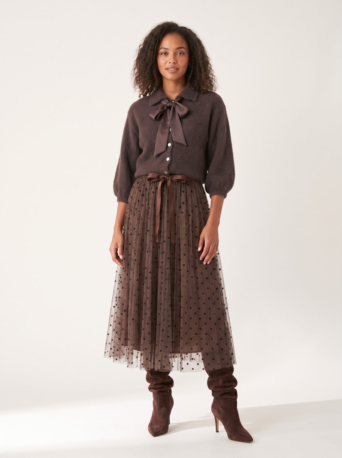 Antoinette chocolate bow-tie cardigan styled with a polka-dot tulle skirt