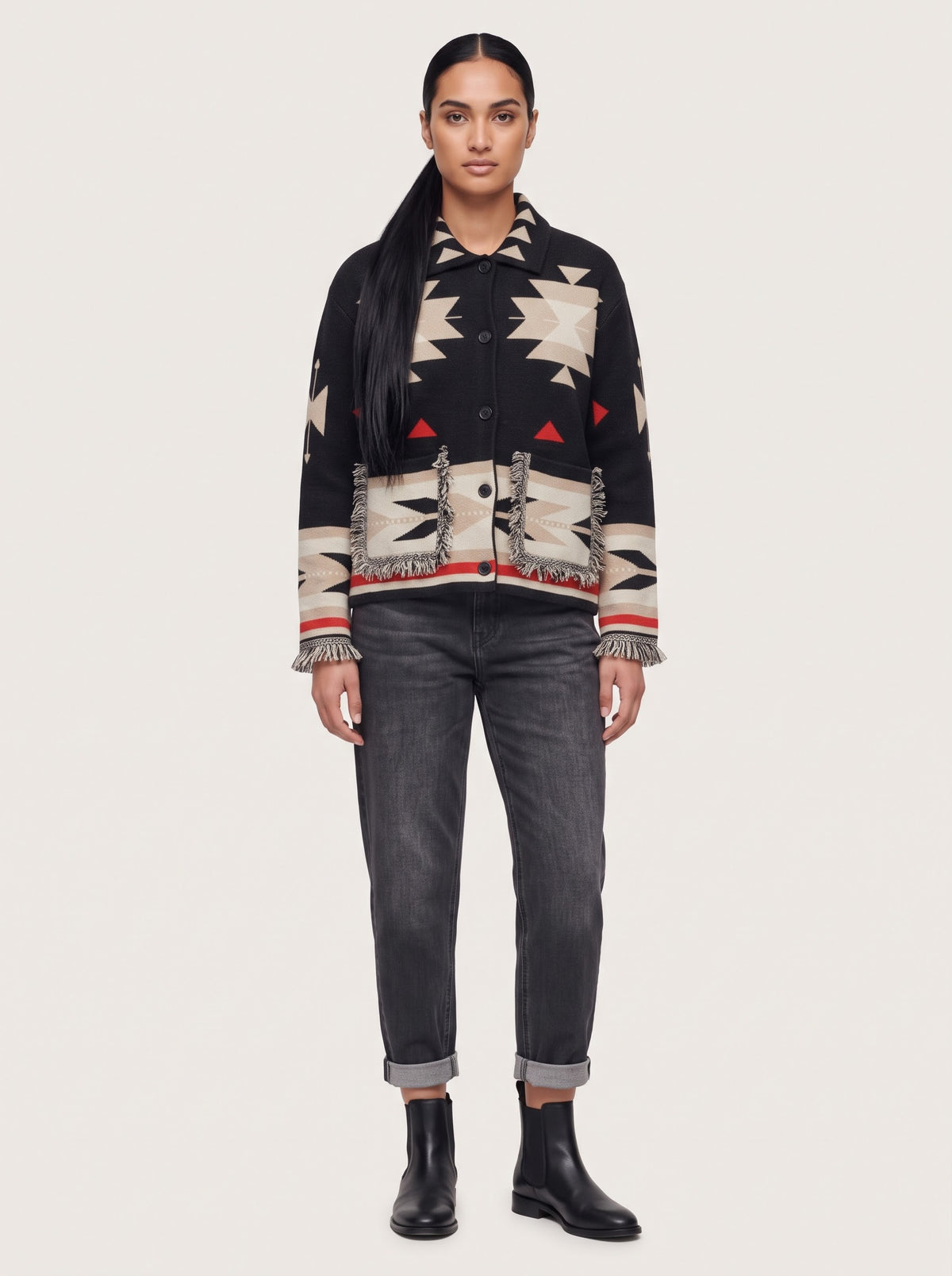 Model wearing the Andra washed black twist-seam barrel-leg jeans