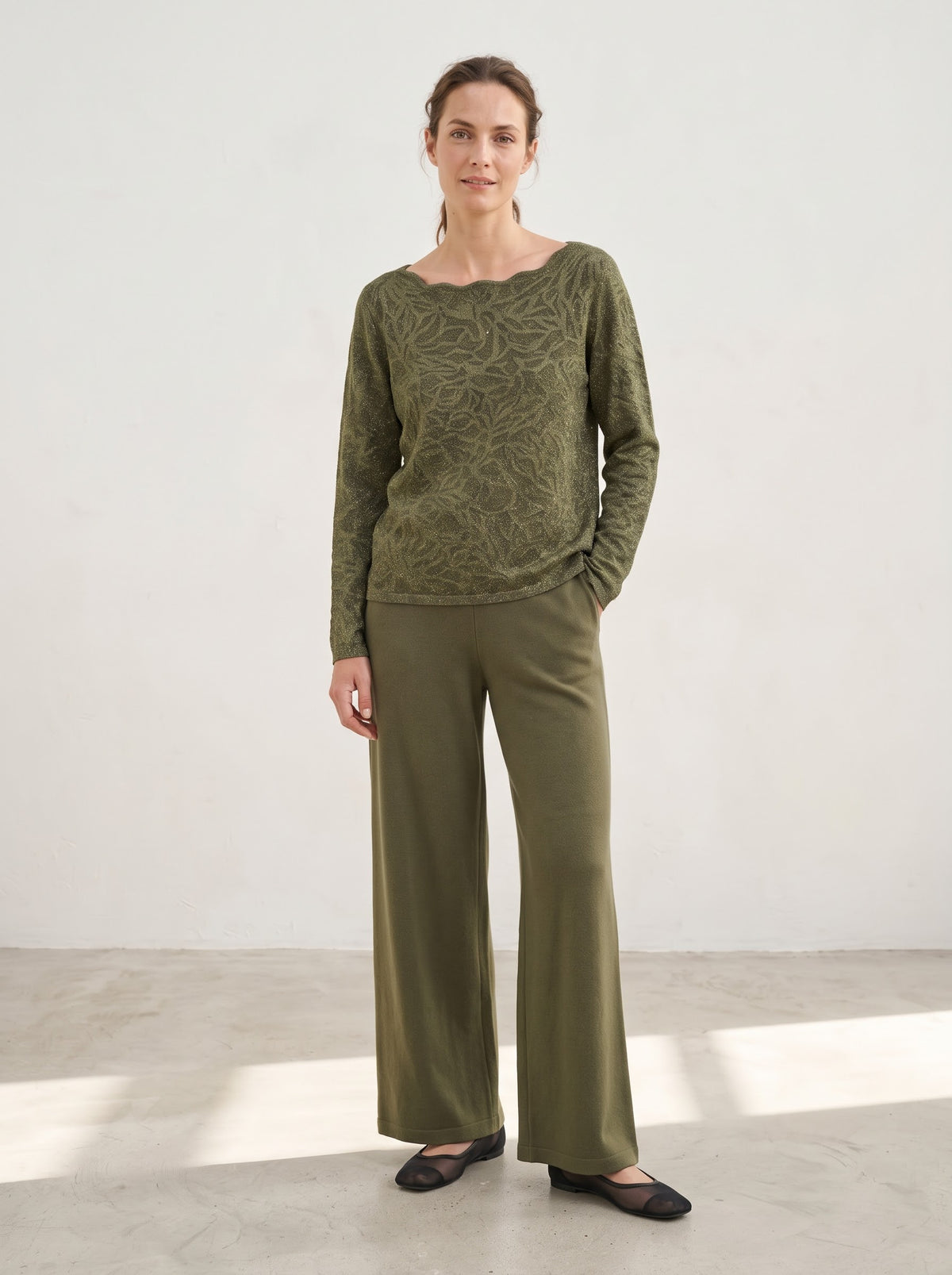 Imani khaki embossed jumper styled with tonal trousers