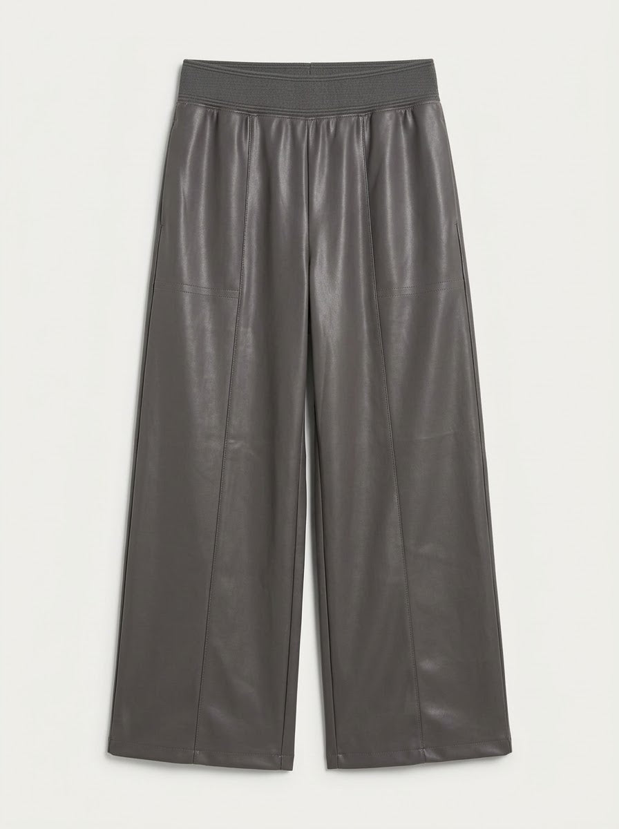 Teri charcoal pleather trousers showing the ribbed waistband and front seams