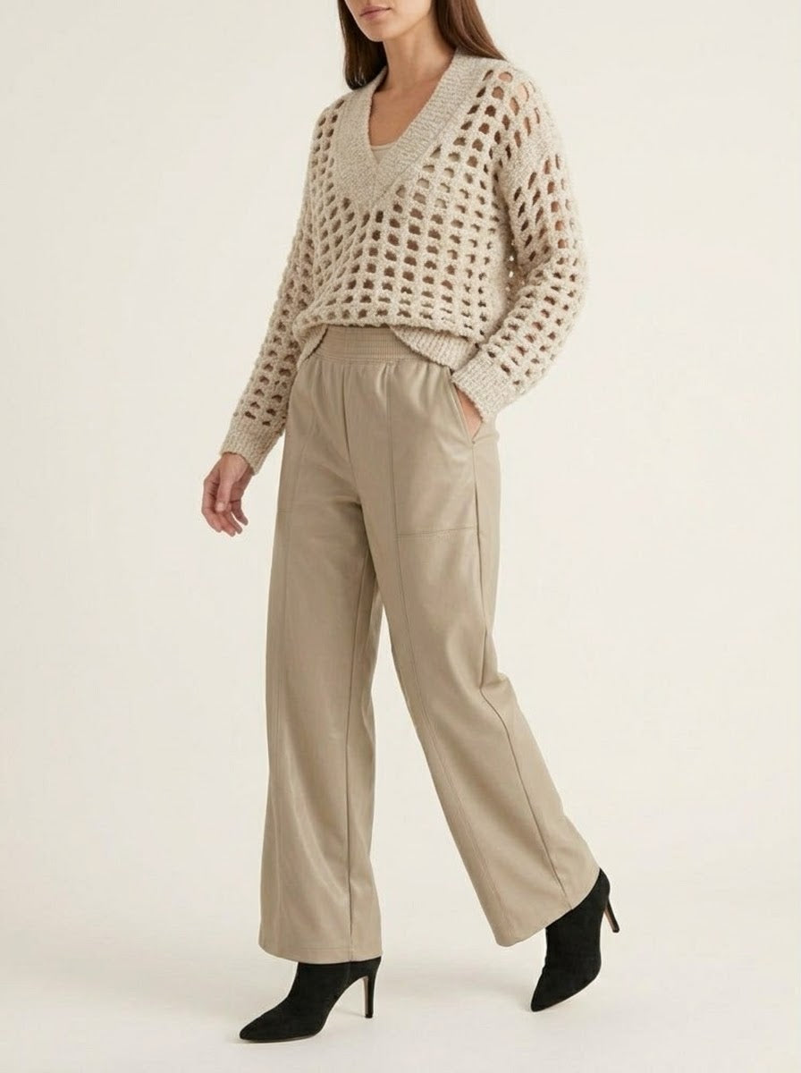 Full-length view of the Meera stone jumper with Teri stone wide-leg trousers