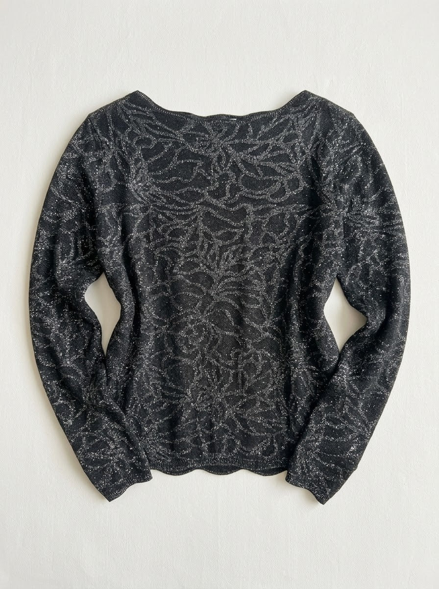 Imani black embossed jumper styled with cropped trousers