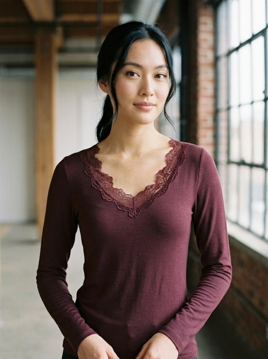 Mollie burgundy soft-touch lace top styled on model