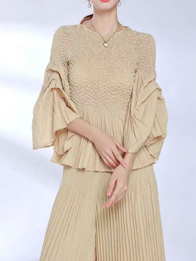 Miranda - Peplum hem part pleated top