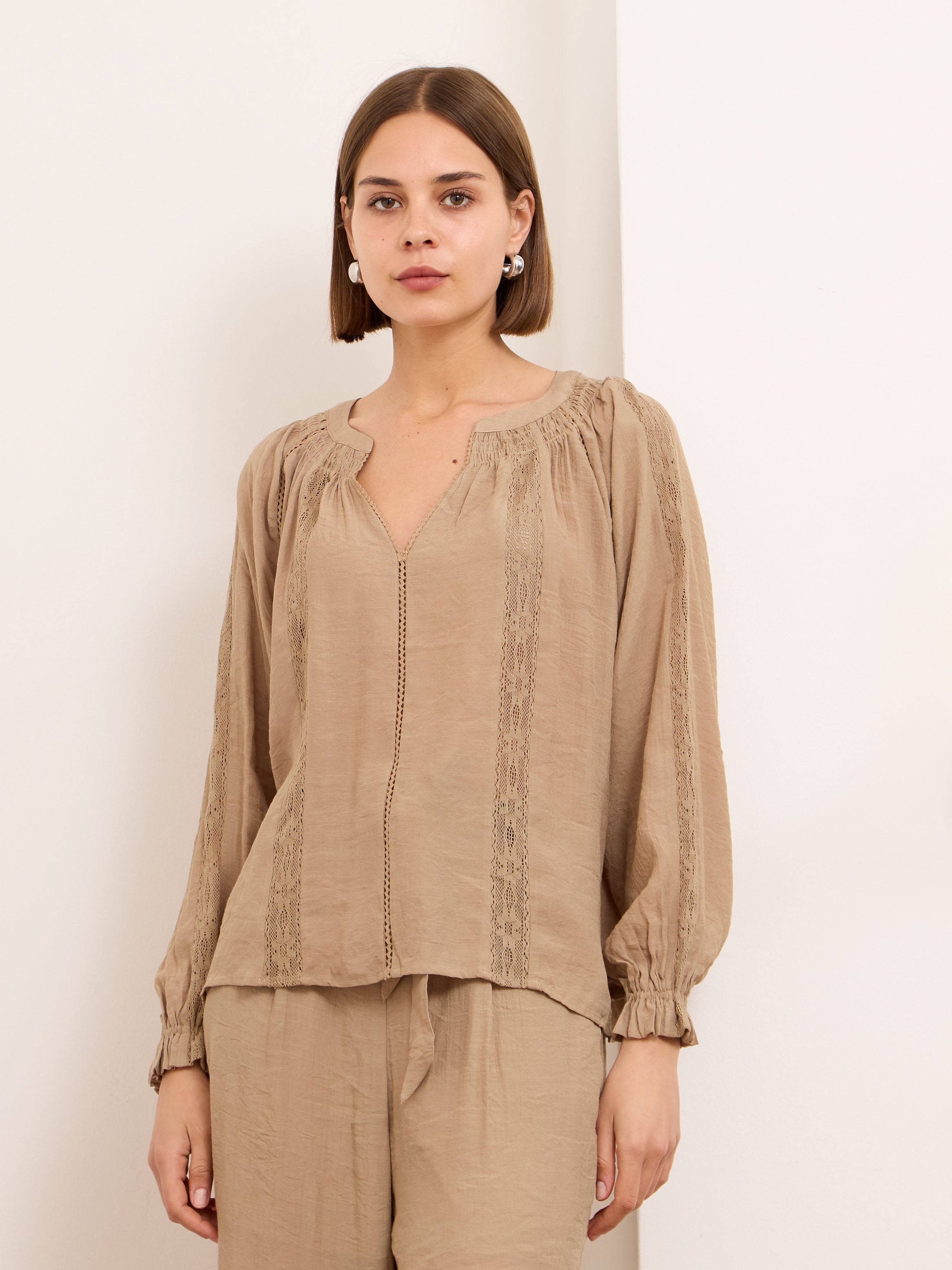 Adelaide sand v neck crochet trim top