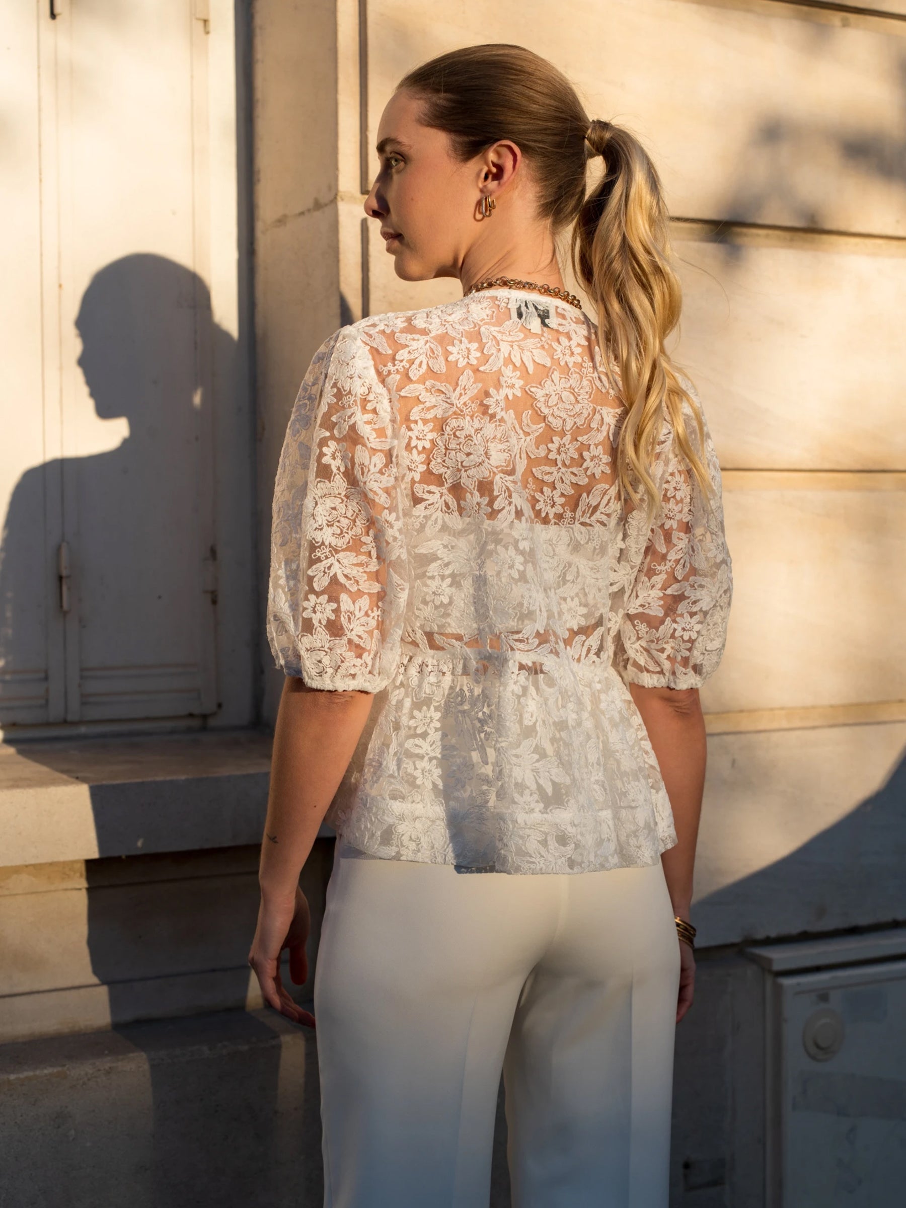 Mari white lace tie front peplum hem top