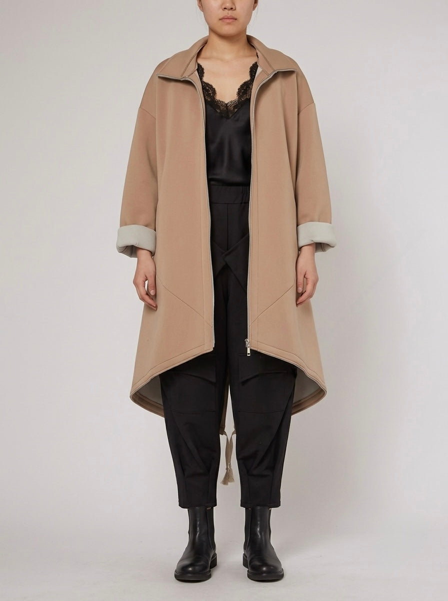 Model wearing the Bronte camel scuba midi coat, front view