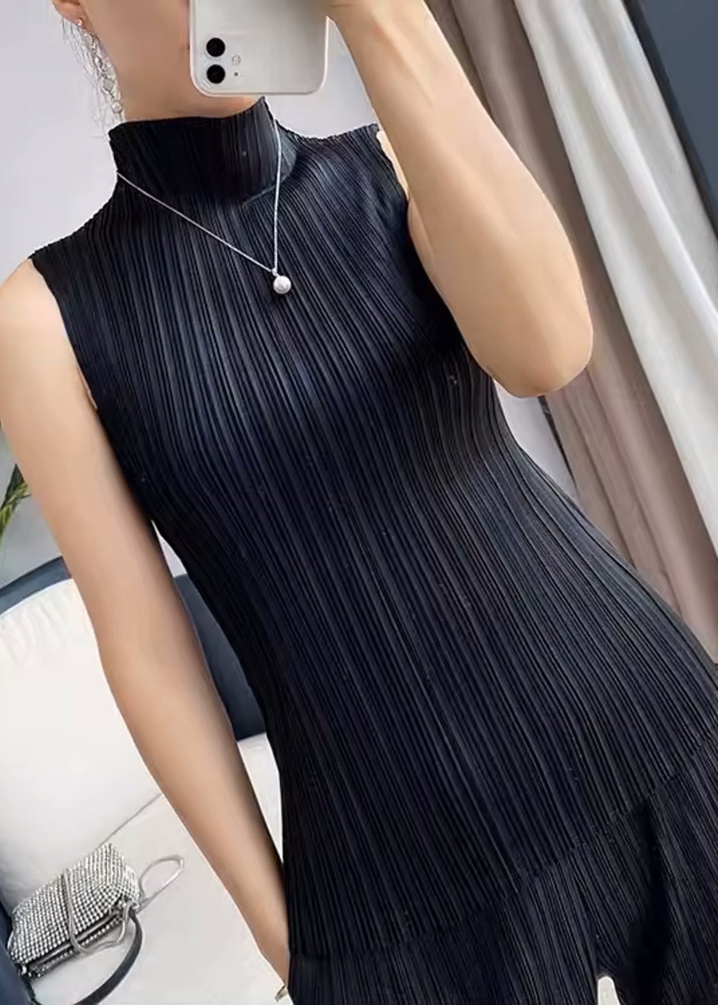 Sheran black sleeveless funnel neck pleated top