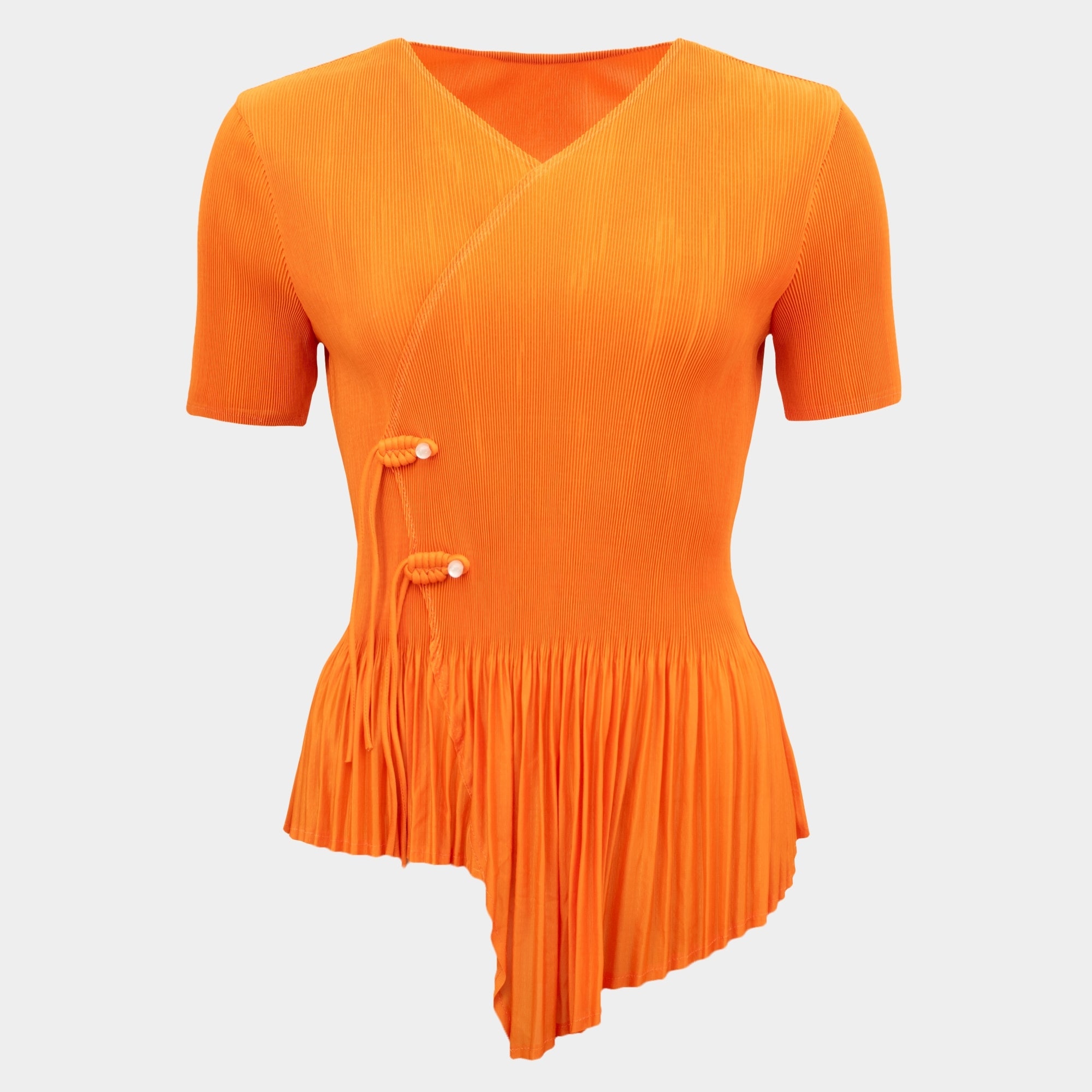 Anais orange cross front frill hem pleat top