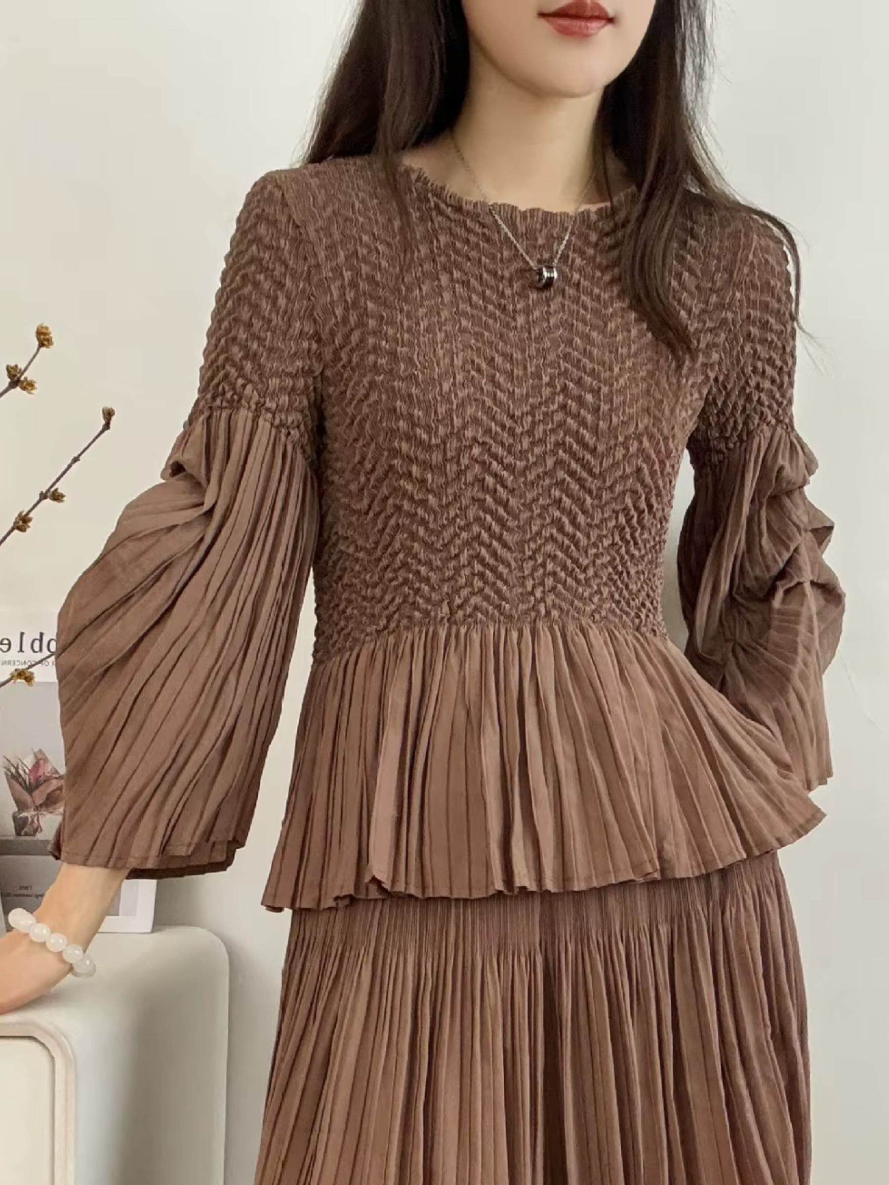 Miranda - Peplum hem part pleated top