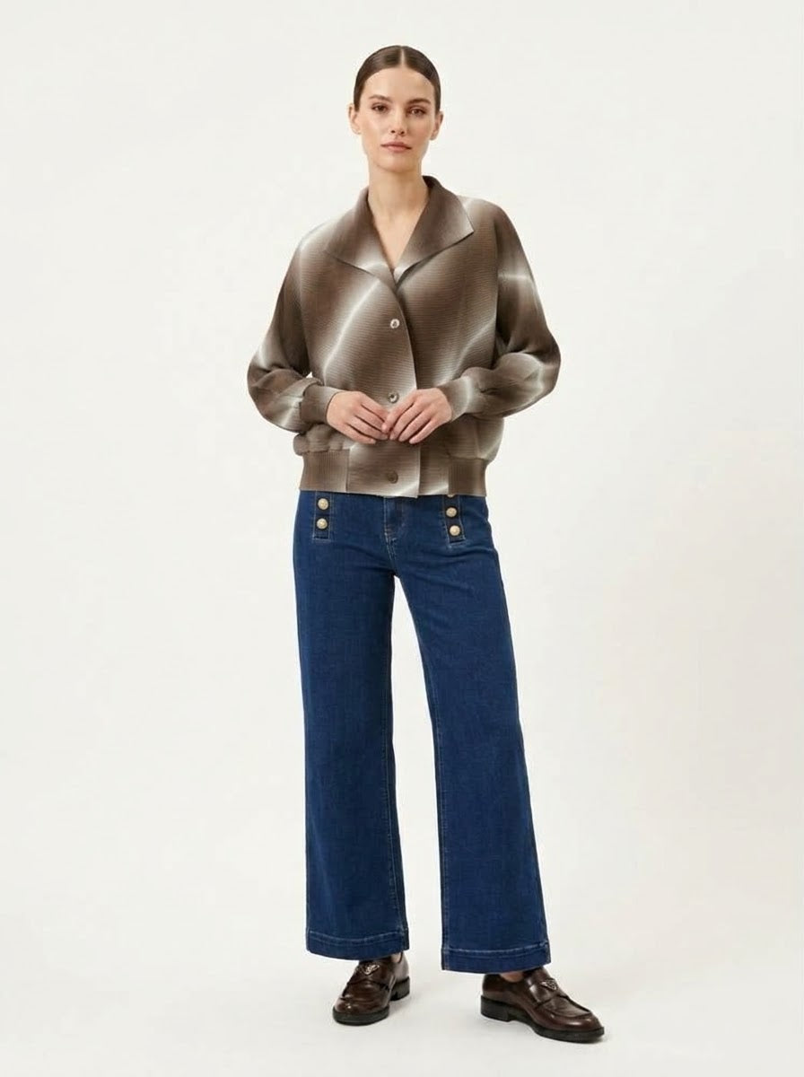 Model wearing khaki Juliette pleated bomber jacket with jeans