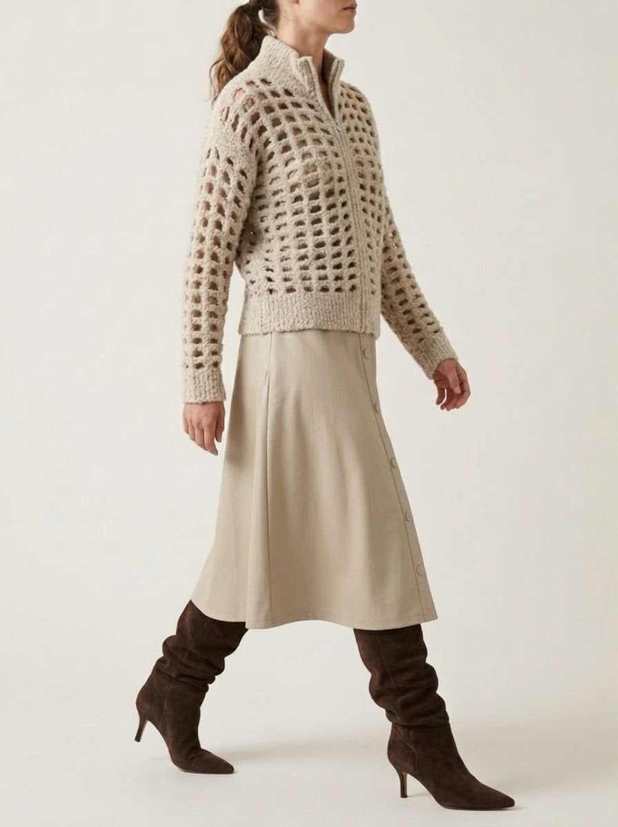 Side view of the Zoe stone A-line skirt showing its flared shape