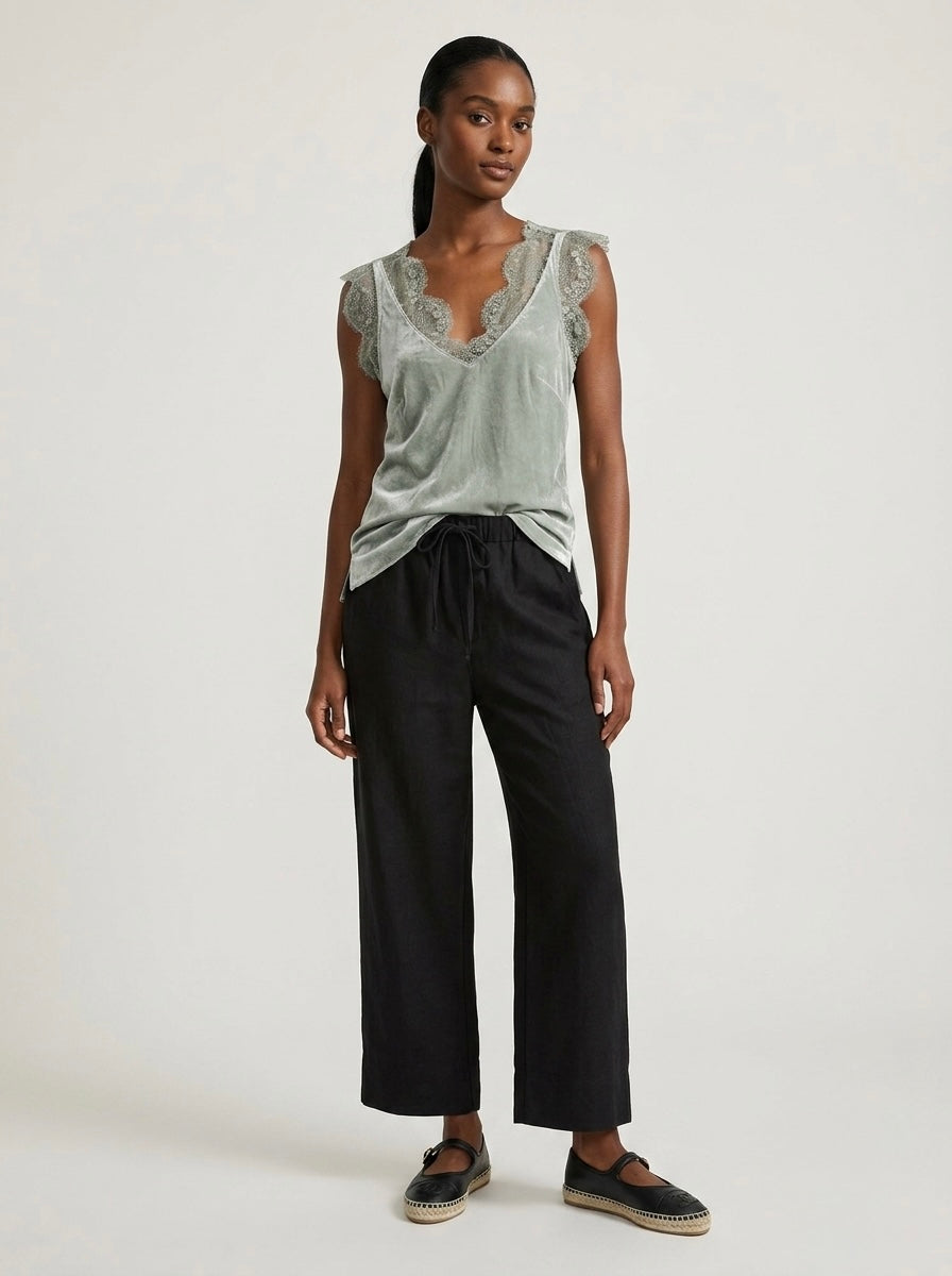 Sage Lacey satin viscose cami top, lace detail view, with lace-trimmed V-neckline and arm openings