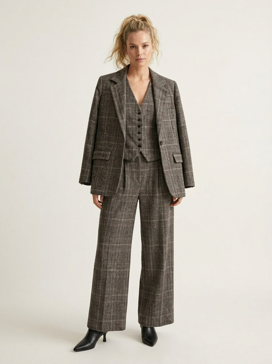 Eva grey checked blazer shown with the coordinating three-piece suit