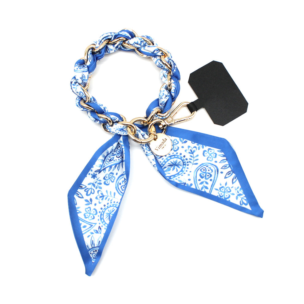 Blue Sandi phone wrist strap with paisley fabric-wrapped gold-tone chain, clasp and phone-case insert tab