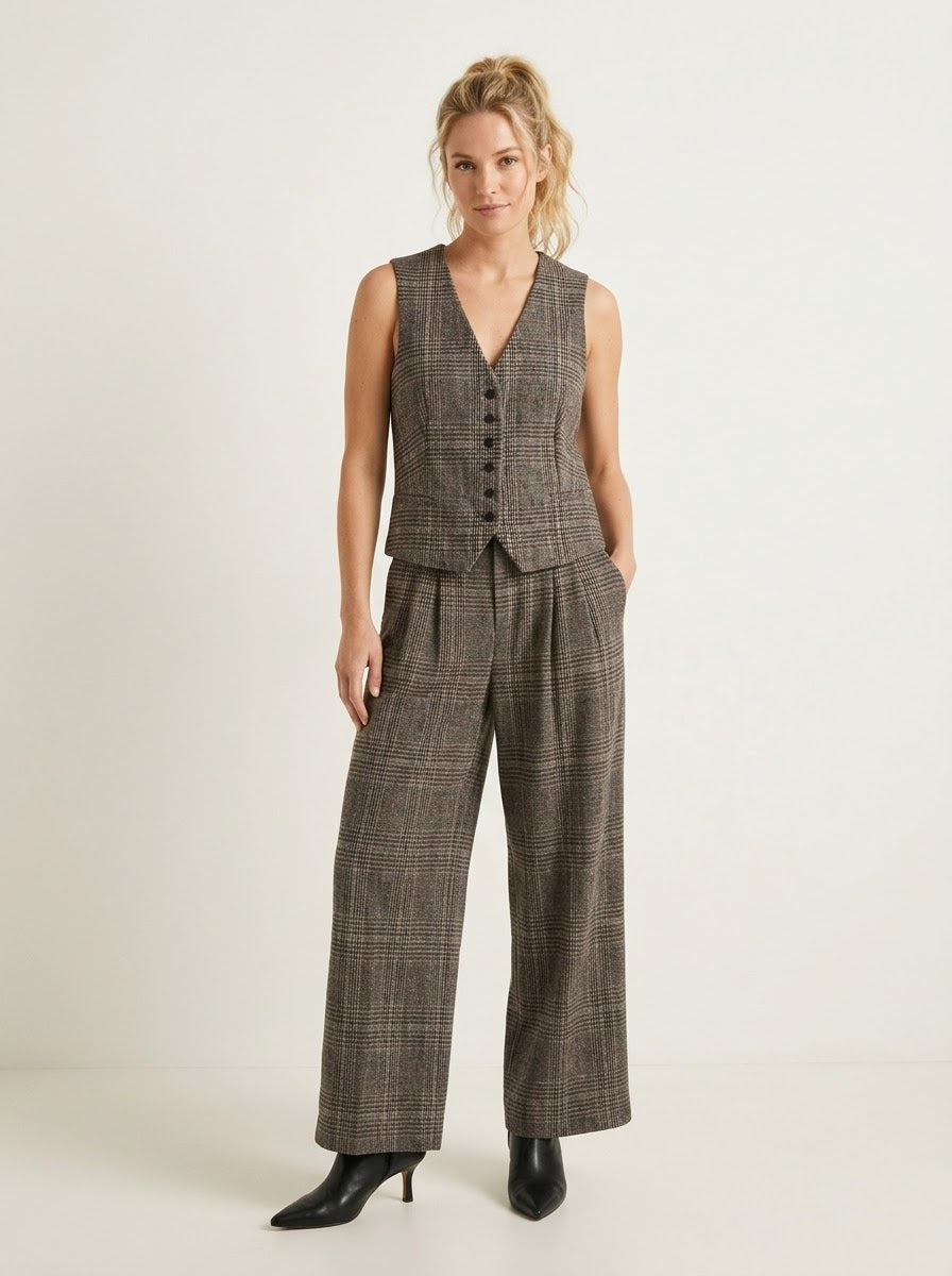 Eva grey checked trousers styled with the matching waistcoat