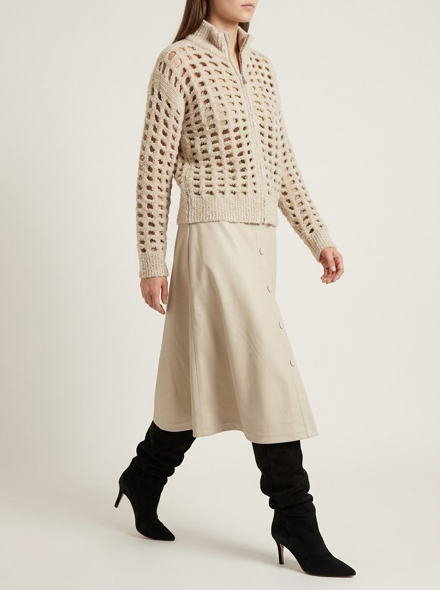 Detail view of the Meera stone zip cardigan showing its sequins and ribbed trims