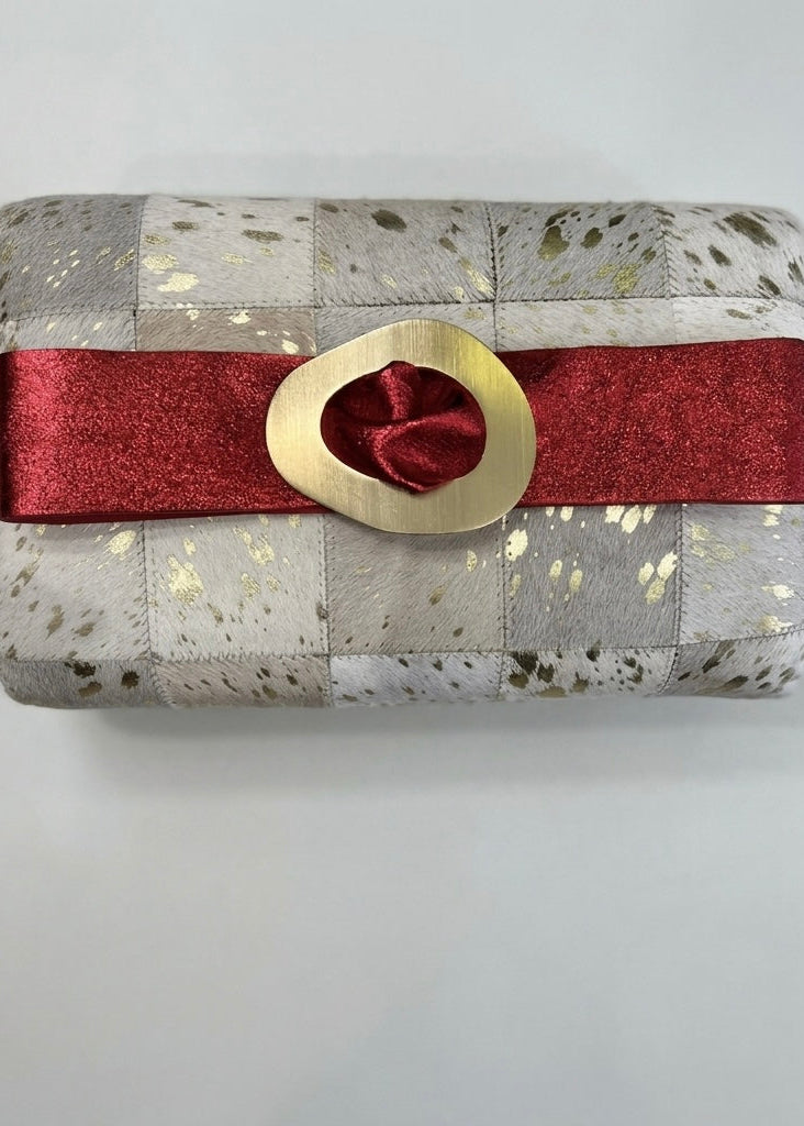 Metallic red leather gold tone buckle belt