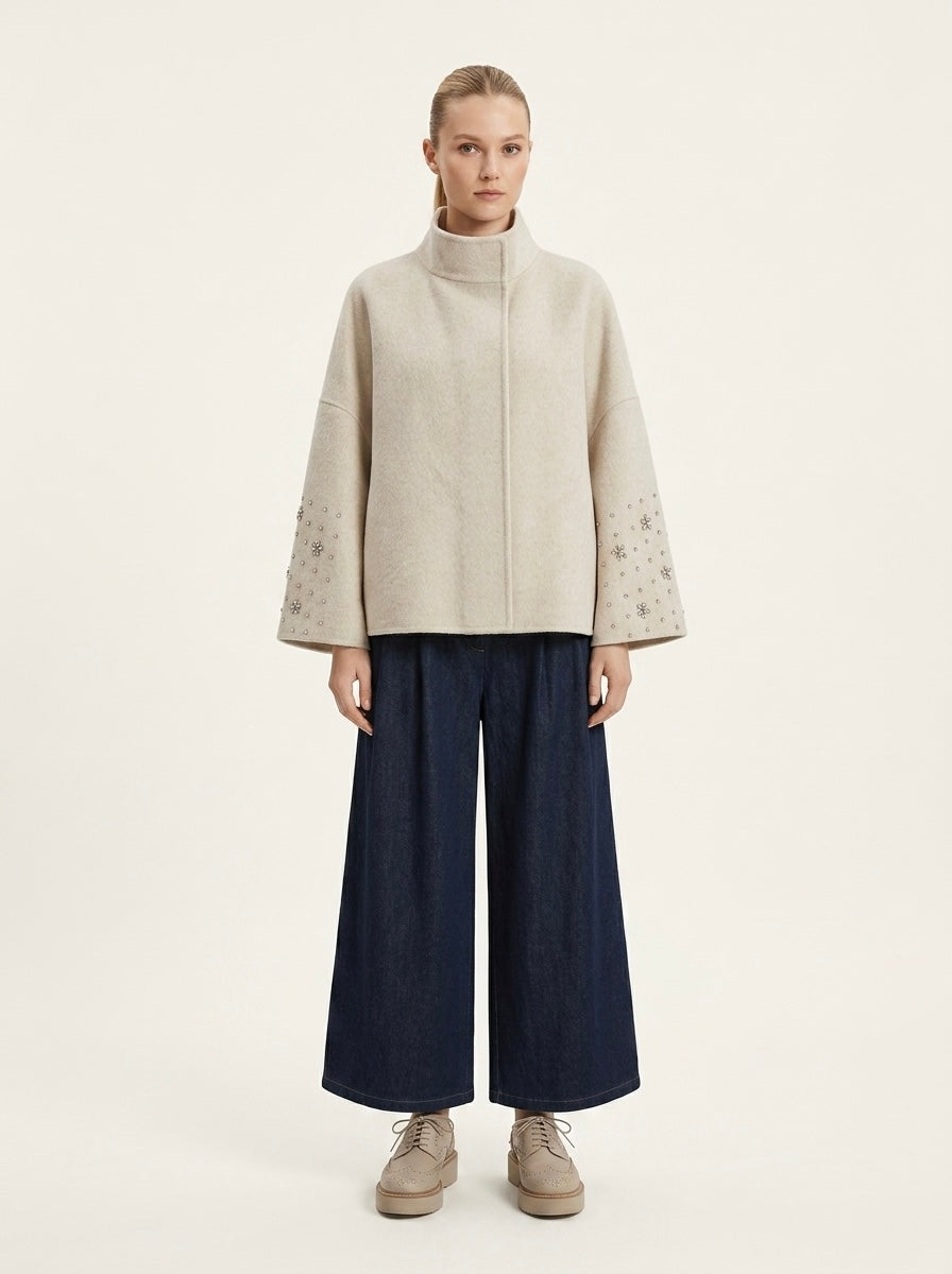 Cream Soraya wool blend cape jacket showing high neckline and wide sleeves