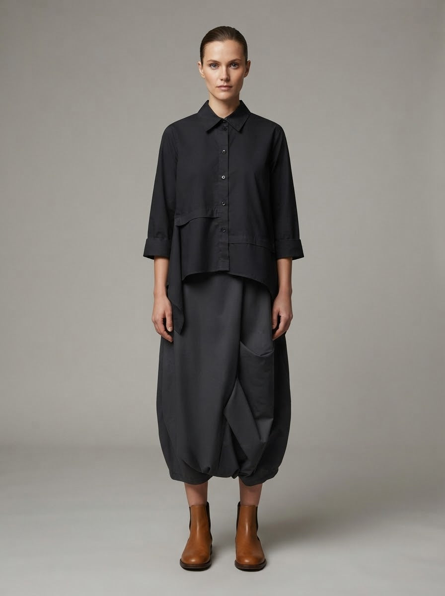 Model wearing black Gaynor cotton shirt with black harem trousers