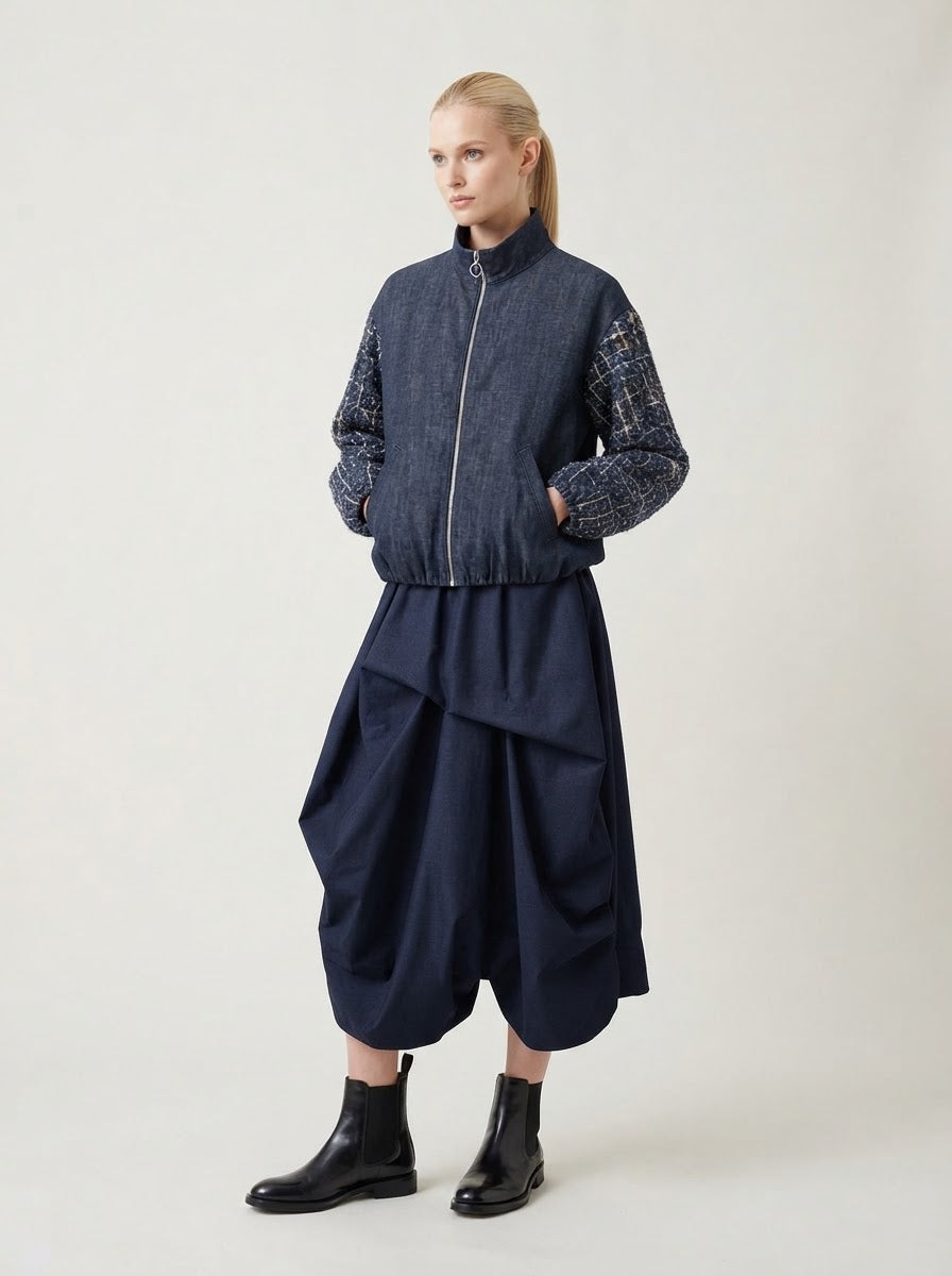 Model wearing Priscilla sequin sleeve denim bomber jacket, front view