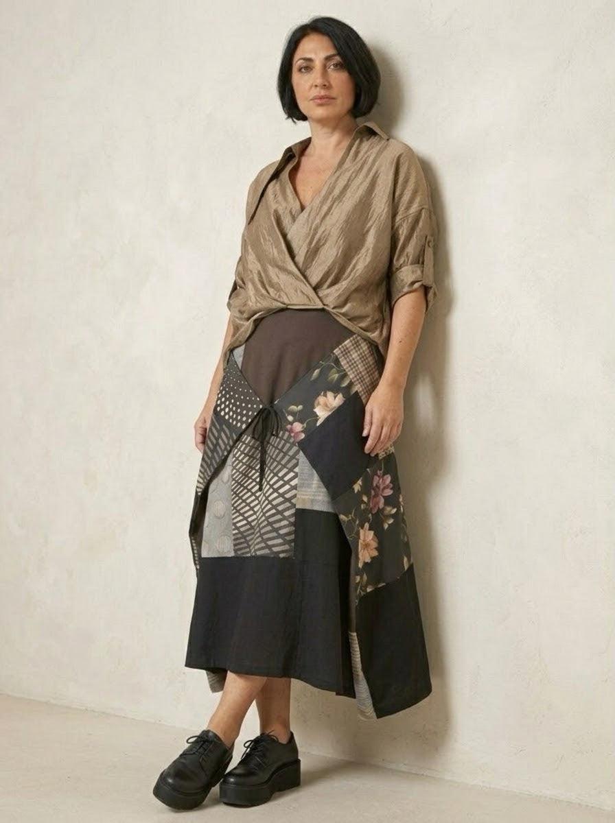 Model wearing Houston patchwork midi skirt with envelope front, three-quarter view