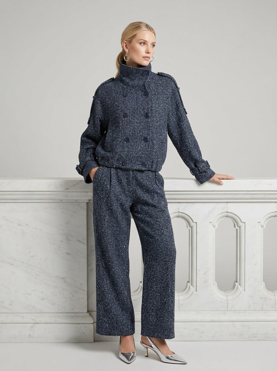 Model wearing the navy Marissa sequin fleck jacket and matching trousers, full-length view