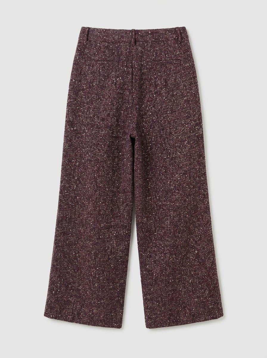 Marissa Bordeaux sequin fleck trousers showing wide leg shape