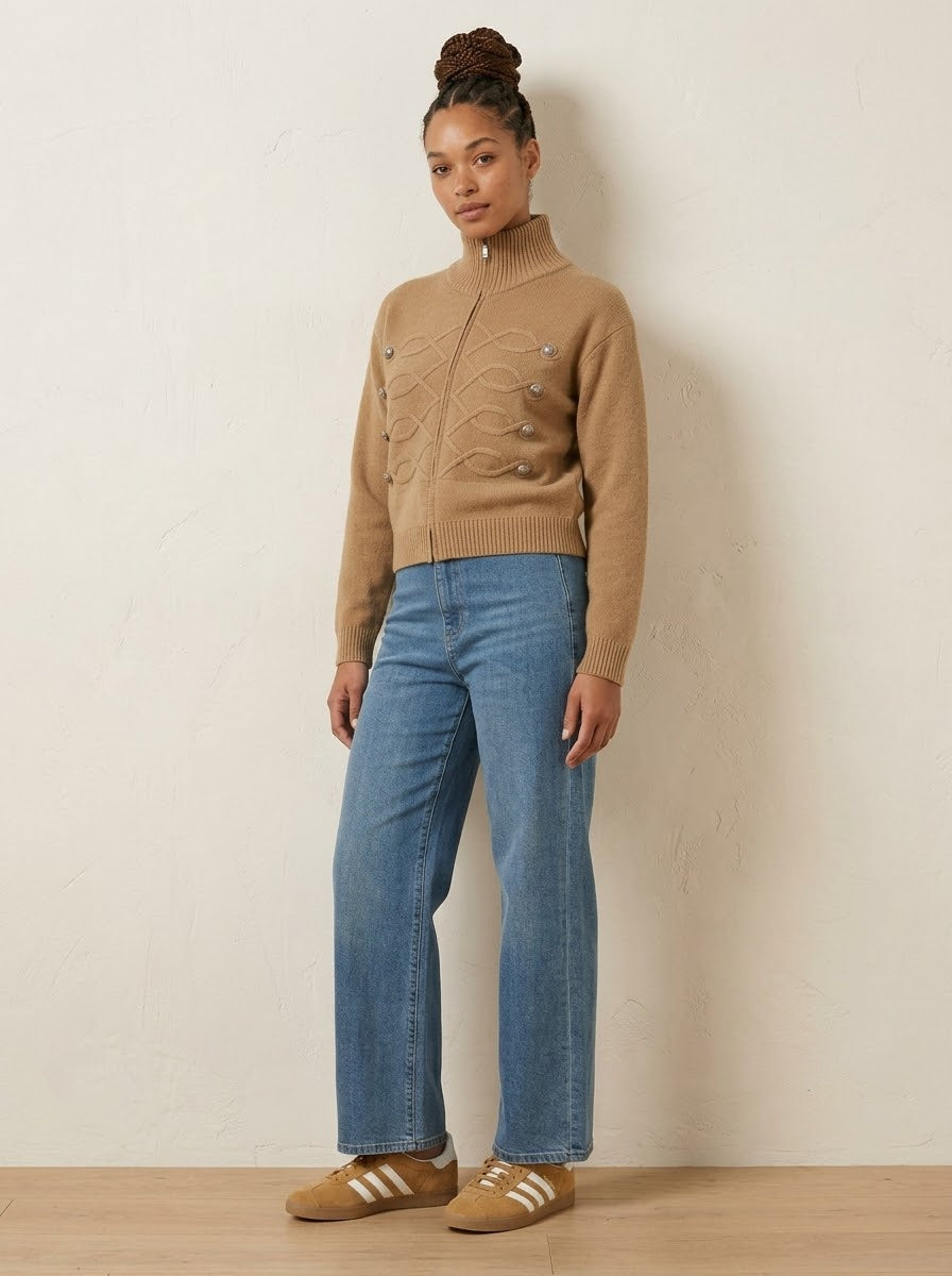 Model wearing Simone regiment knitted jacket in camel with denim jeans, full-length view