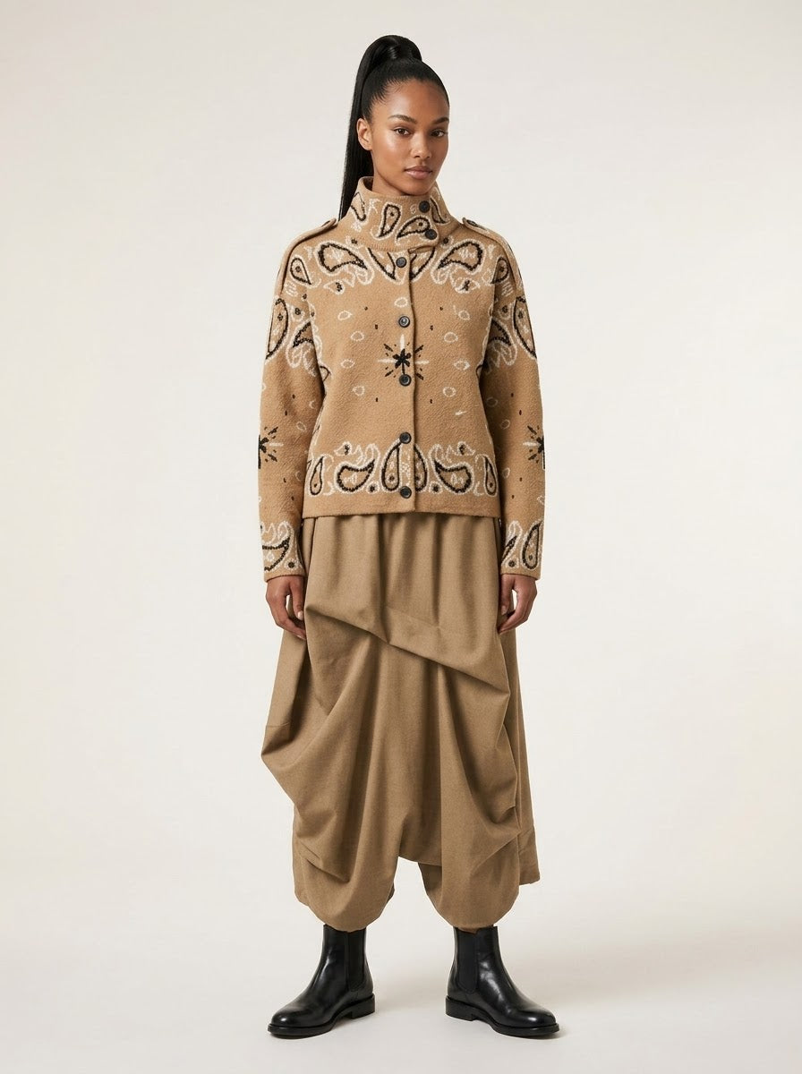 Model wearing Sadie paisley knitted jacket in camel, full-length front view