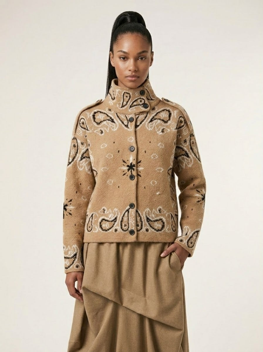 Model wearing Sadie paisley knitted jacket in camel, close front view
